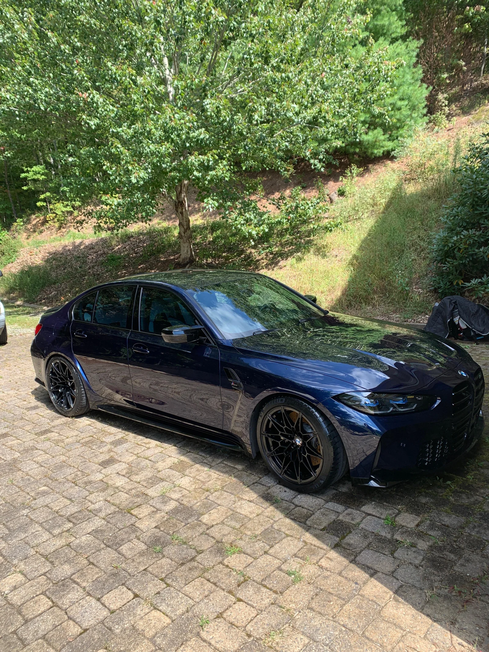 Same car with a deep, glossy detailed finish