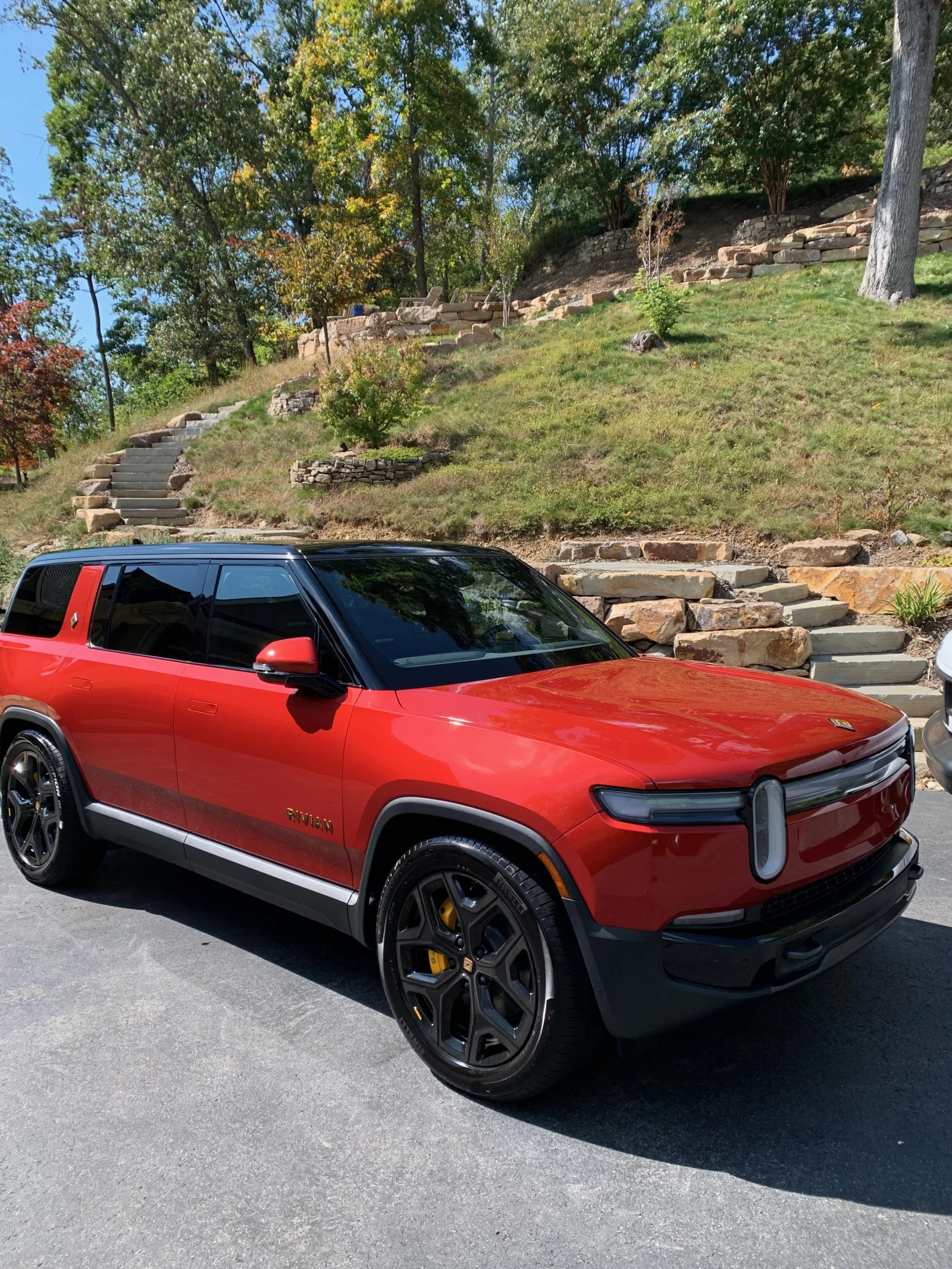 Red adventure SUV cleaned, polished, and protected after detailing